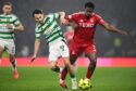 Celtic's Nicolas Kuhn (L) and Aberdeen's Duk in action during the Premier Sports Cup semi-final. Image: SNS