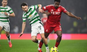 Celtic's Nicolas Kuhn (L) and Aberdeen's Duk in action during the Premier Sports Cup semi-final. Image: SNS