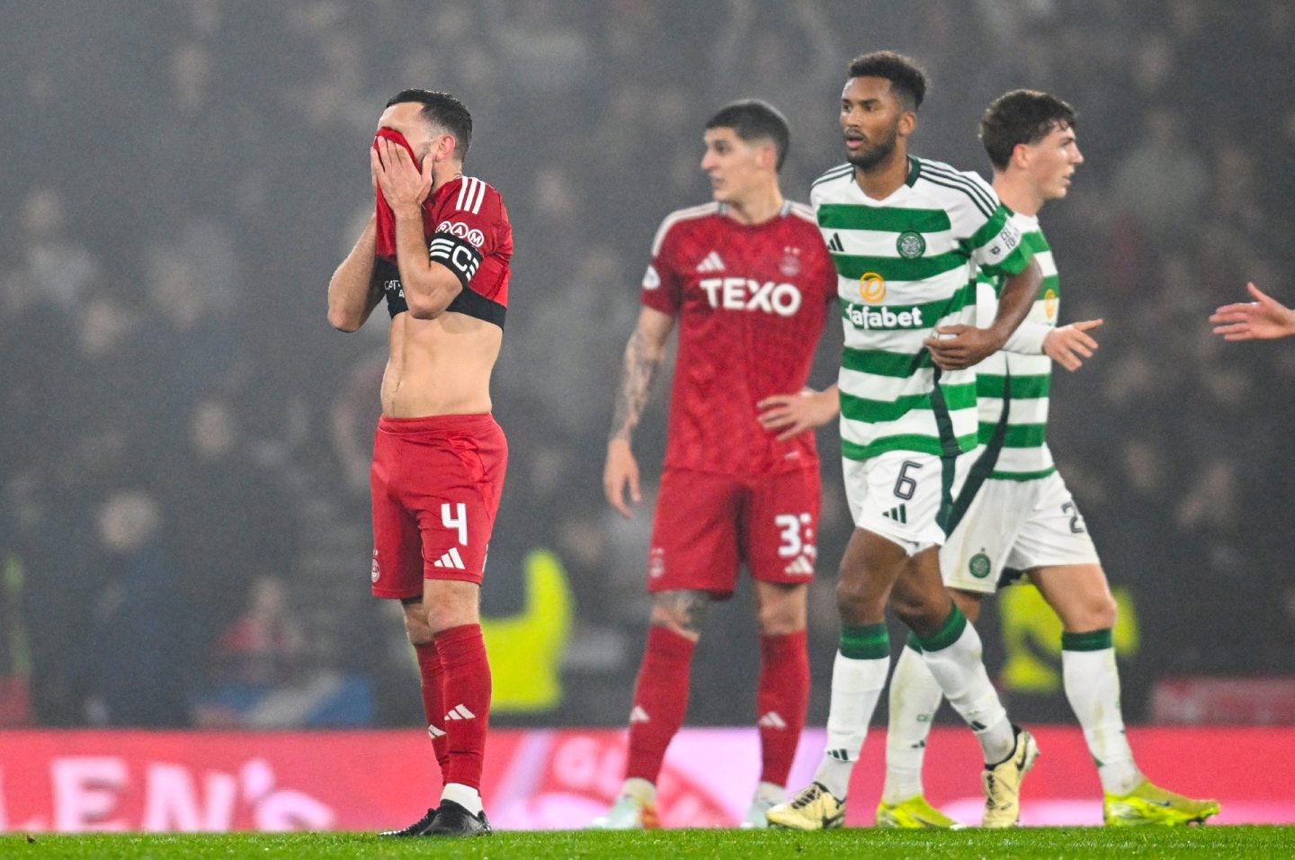 Aberdeen's Graeme Shinnie looks dejected during the 6-0 League Cup loss to Celtic at Hampden.