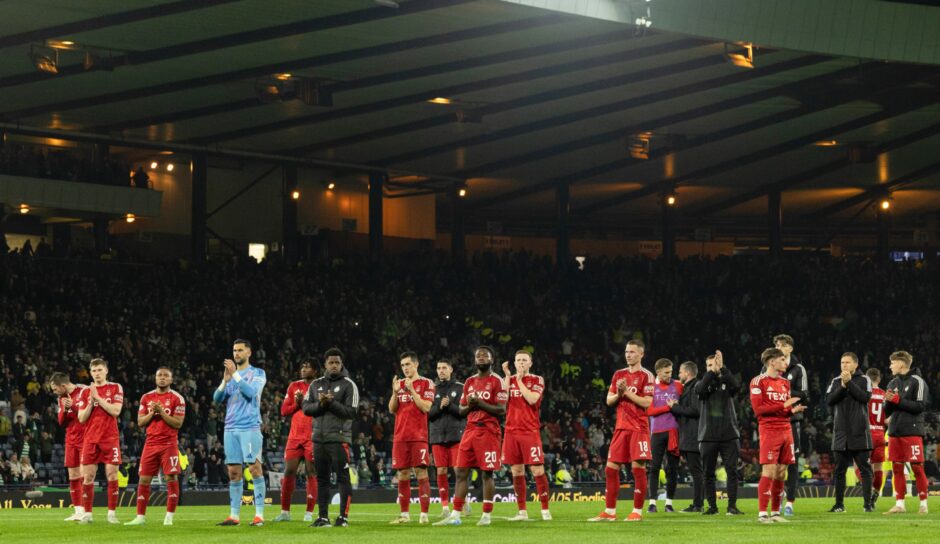 Aberdeen players applaud the fans at full-time after the Premier Sports Cup semi-final match between Celtic and Aberdeen at Hampden Park, on November 2, 2024, in Glasgow, Scotland. Image: SNS.