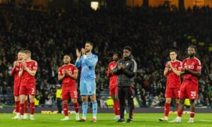 Aberdeen's players applaud the fans at full-time after League Cup semi-final defeat to Celtic earlier in the season. Image: SNS.