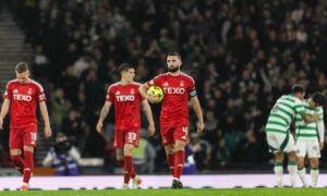 Aberdeen's Graeme Shinnie looks dejected during the 6-0 League Cup semi-final loss to Celtic at Hampden