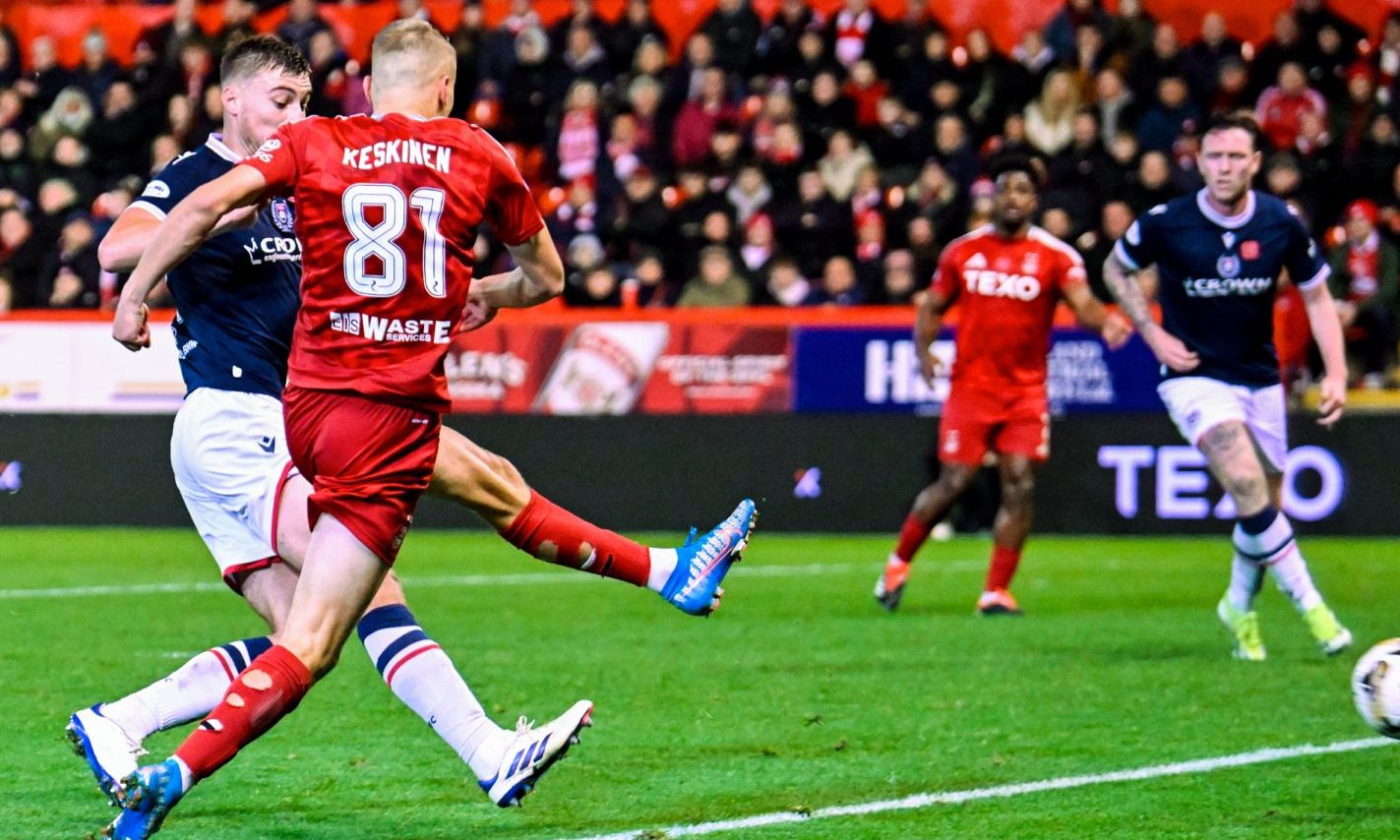 Aberdeen's Topi Keskinen scores to make it 2-0 during a Premiership match against Dundee at Pittodrie. Image: SNS