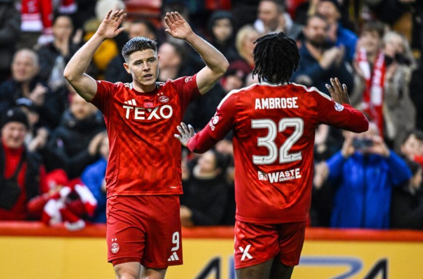 Aberdeen striker Kevin Nisbet (L) celebrates scoring to make it 4-1 against Dundee. with Peter Ambrose. Image: SNS