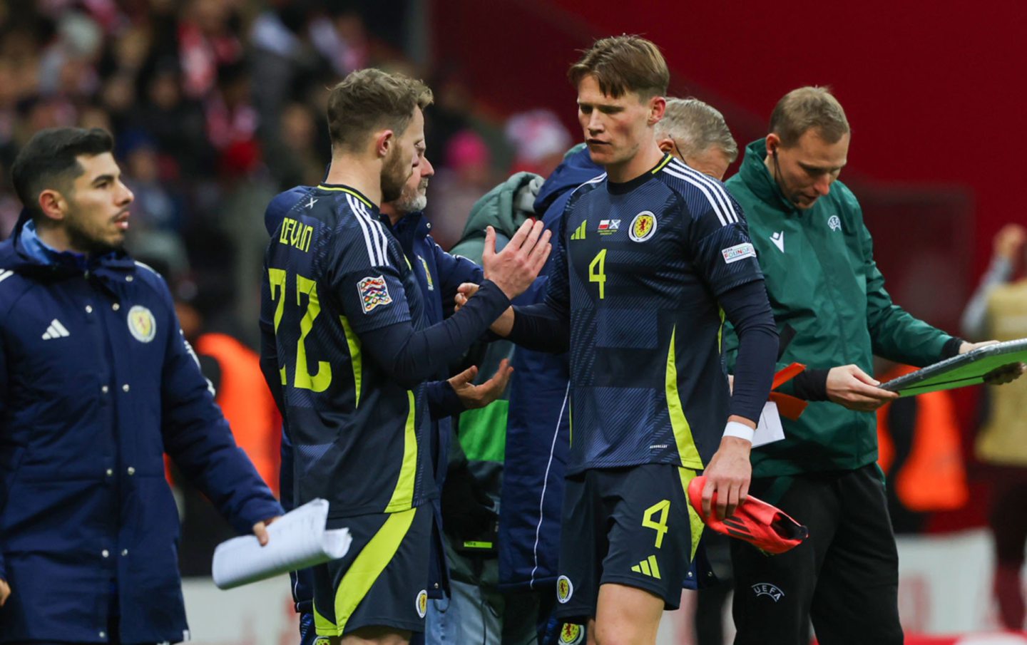  Scotland's Nicky Devlin and Scott McTominay during the UEFA Nations League 2024/25 League A Group A1 match against Poland in Warsaw. Image: SNS 