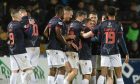 Ross County's Josh Nisbet (right) celebrates after making it 2-0. Image: Mark Scates/SNS Group.