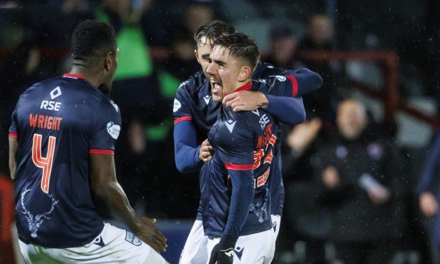 Ross County's Josh Nisbet celebrates after netting his first goal for the club in the 2-1 victory over Motherwell. Image: SNS.