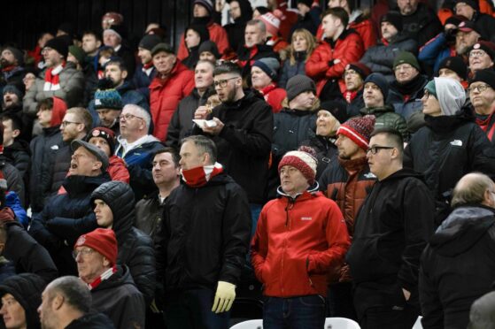 Aberdeen fans during the 2--1 Premiership loss to St Mirren in Paisley. Image; SNS