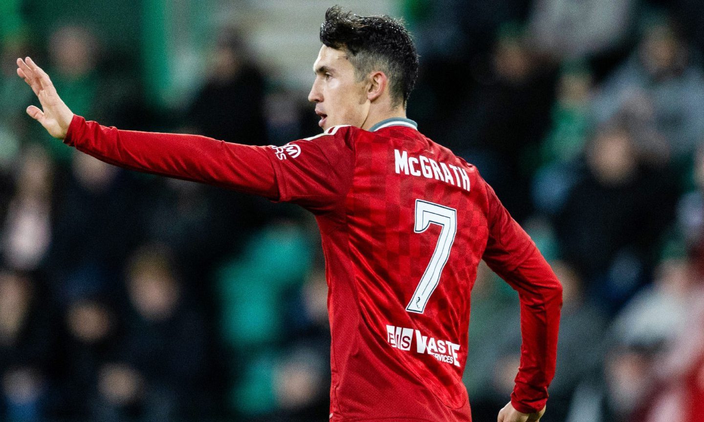 Aberdeen midfielder Jamie McGrath directs team-mates during the 3-3 draw with Hibs at Easter Road, a game in which he scored. 