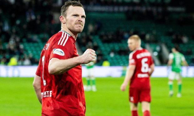 Aberdeen's Nicky Devlin celebrates after scoring against Hibernian. Image: SNS.