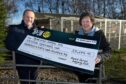 Press & Journal Editor, Craig Walker presents a cheque for over £15,000 to Iona Nicol of the Munlochy Animal Aid charity, based at Munlochy on the Black Isle, as part of our 275 P&J Community Fund.
Image: Sandy McCook/DC Thomson