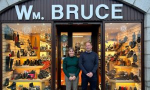 Steven and Dale Bruce outside their shoe store WM Bruce.