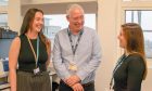 Merran, George King and Mhairi laughing and talking together in ARI.