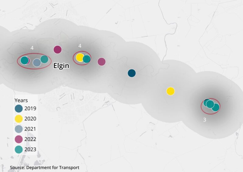 A close-up of A96 crash blackspot near Elgin with three individual clusters of four, four and three crashes. Each crash is indicated with a smaller coloured point.