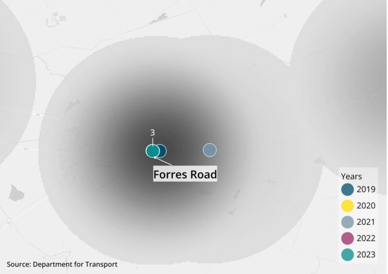 A close-up of A96 crash blackspot near Forres Road with four crashes indicated with smaller coloured points. Three overlap over the 2023 crash and an additional crash from 2021 is on the right edge of the cluster.