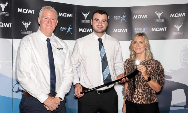 Mowi Player of The Year Premiership and; National Division - Blair Morrison, Caberfeidh (centre) pictured with Dougie Hinter and Jayne Mackay from Mowi. Image: Neil Paterson.