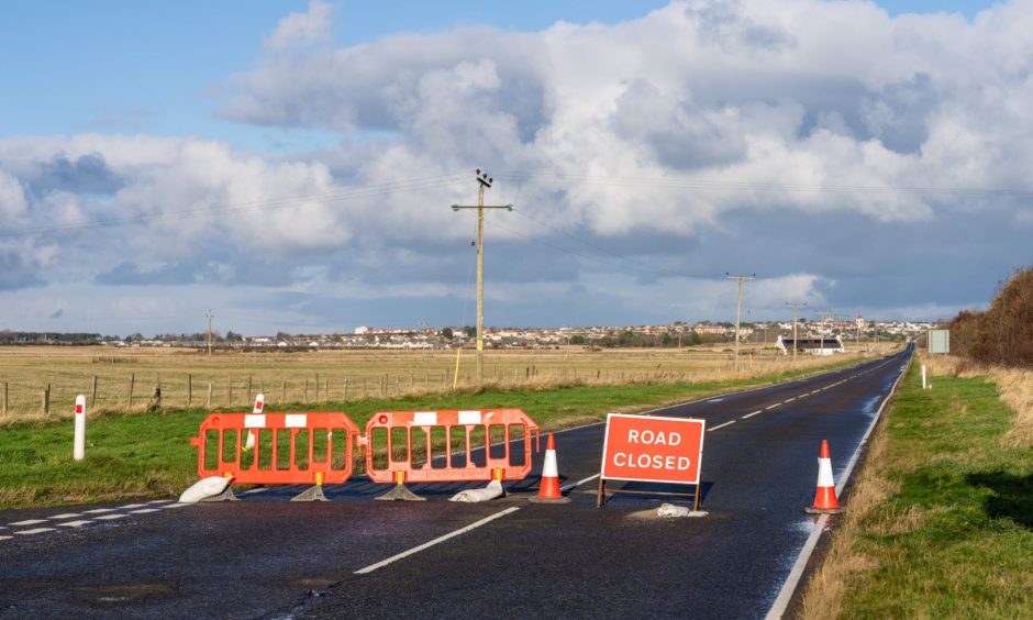 Road closed sign on A941