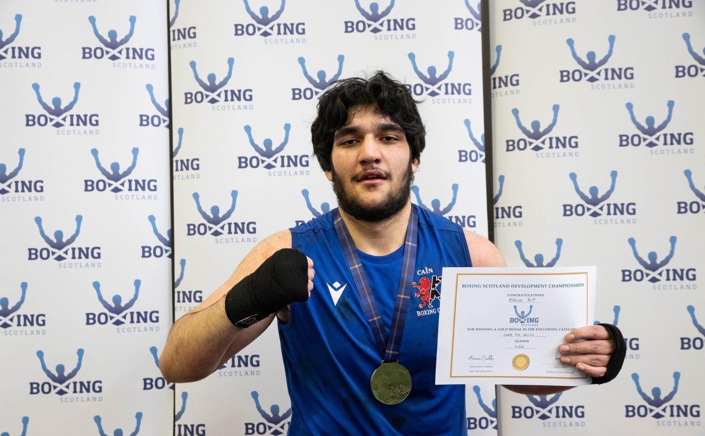 Abdullah Butt of CAIN Boxing Club wins gold at the Scottish Development Championships. Image by Vera Cloe Zebrowska