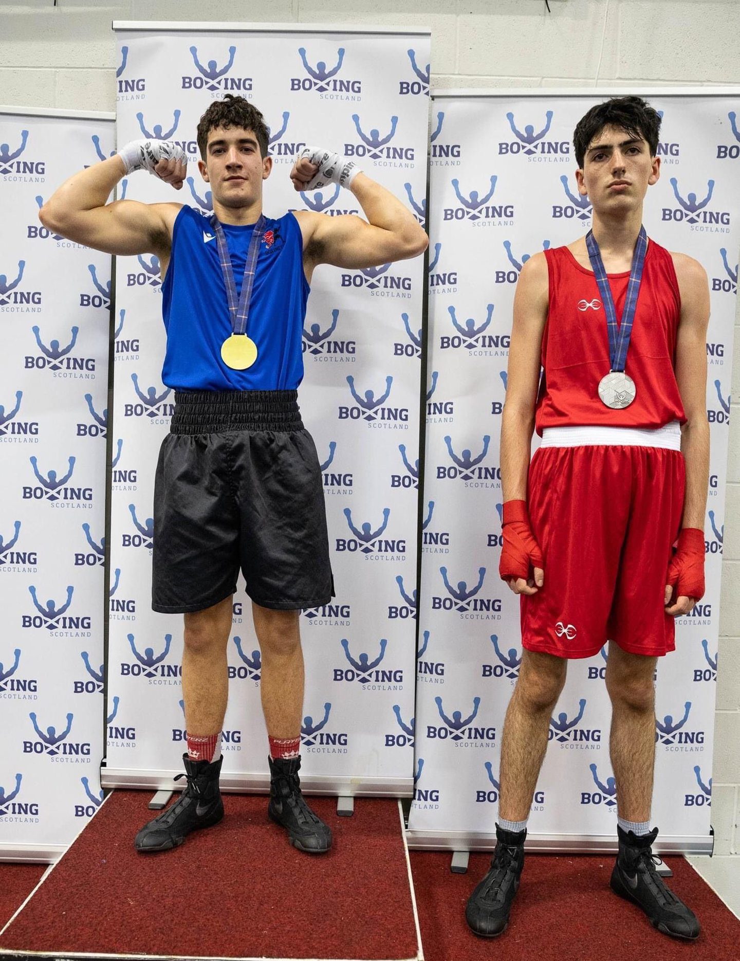 Jamie Binnie (left) of CAIN Boxing Club wins gold at the Scottish Development Championships. Image Vera Cloe Zebrwska 