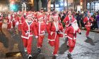 The Santa run makes for a great sight. Image: Chris Sumner/ DC Thomson.