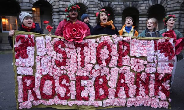 Climate activists from Greenpeace and Uplift during a demonstration outside the Scottish Court of Session, Edinburgh, on the first day of the Rosebank and Jackdaw judicial review hearing.  Image: PA.