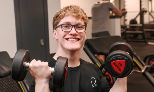 Jamie Williams at the Pure Gym in Rubislaw. The 19-year-old, who has cerebral palsy, is a personal trainer at the gym. Image: Darrell Benns/DC Thomson