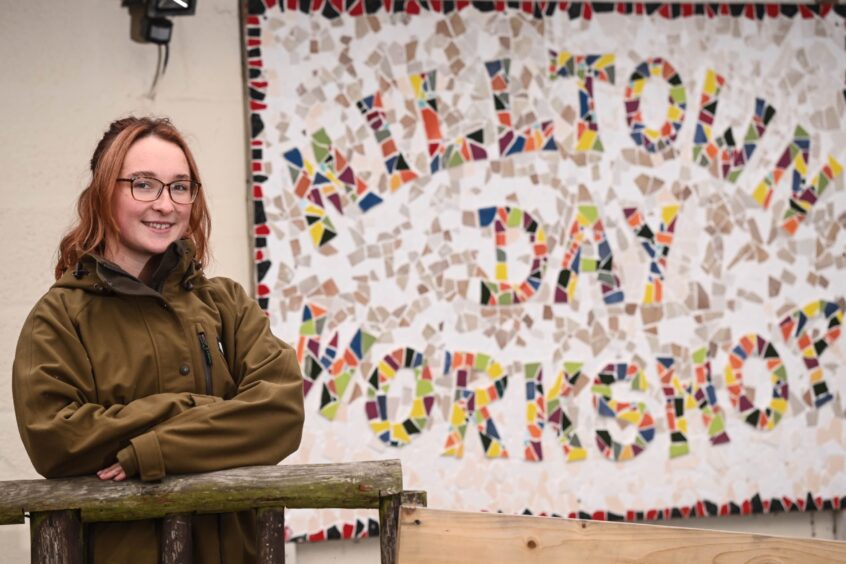 Katie outside the Milltown Day Workshop. 