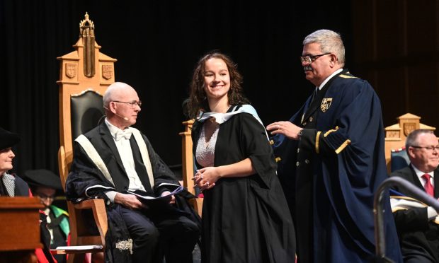 A graduate on stage during the ceremony. All images: Darrell Benns/DC Thomson