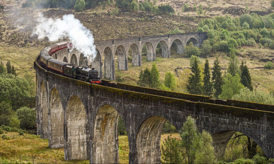 The 'Harry Potter train' aka The Jacobite, on which The Hogwarts Express was based, on the Glenfinnan Viaduct.