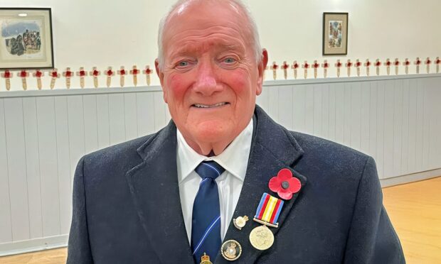 Davie Mitchell watched an H bomb explode in 1958 and now has his Nuclear Test medal.