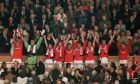 Manchester United's Eric Cantona lifts the FA Cup as his teammates celebrate; (l-r) Cantona, Peter Schmeichel, Denis Irwin, David May, Phil Neville, David Beckham, Gary Neville, Gary Pallister, Nicky Butt