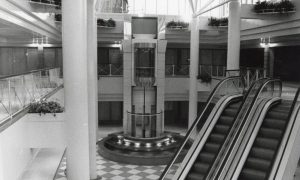 Black and white image inside St Giles Centre.