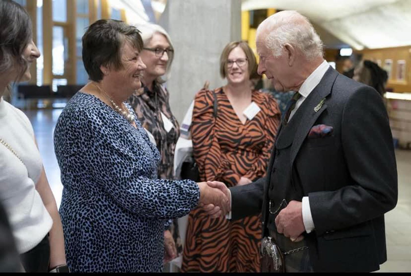 Helen Reid from Laurencekirk shaking hands with King Charles 