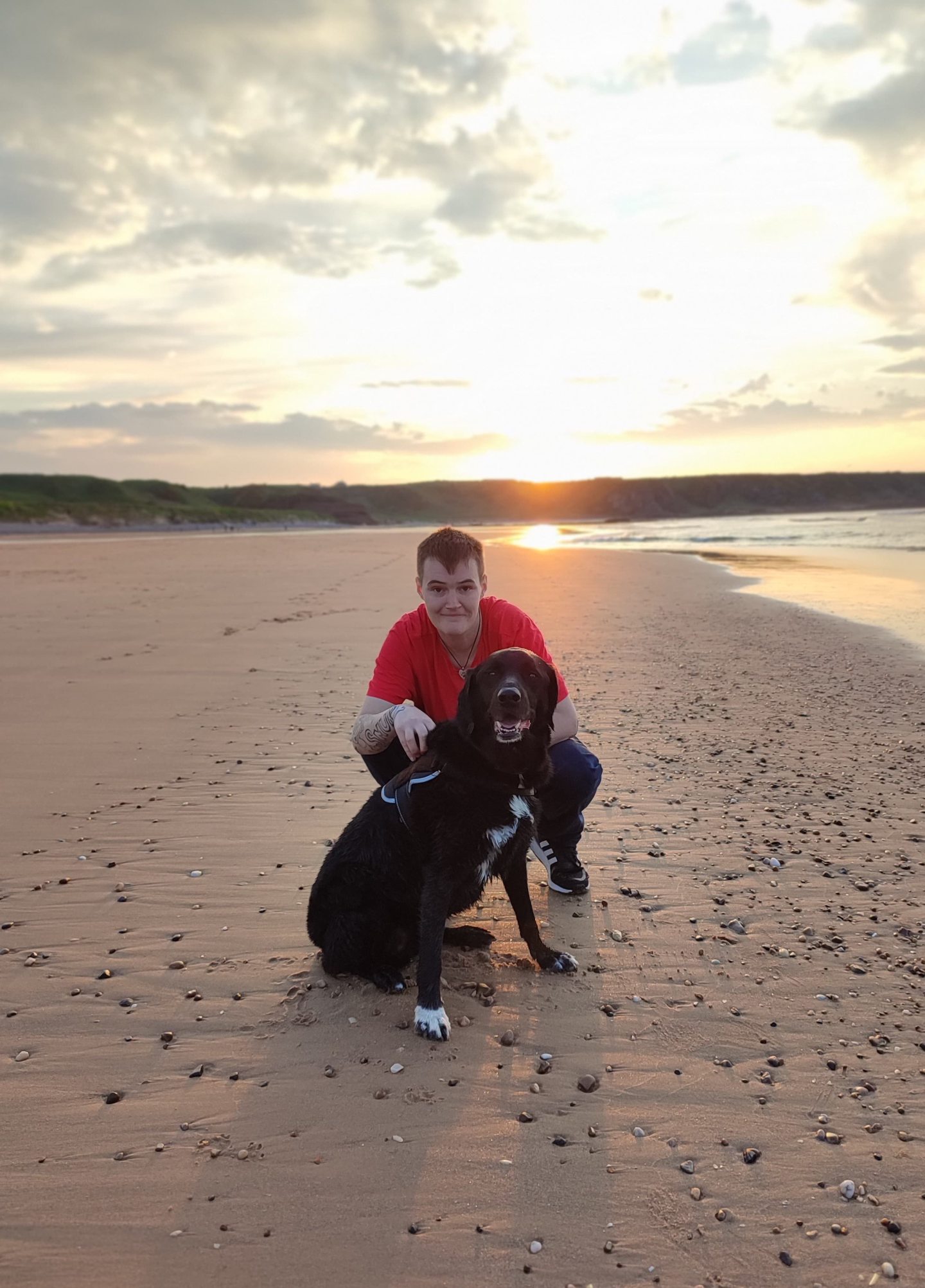 Hannah Souter from Banff with Thor on the beach. 