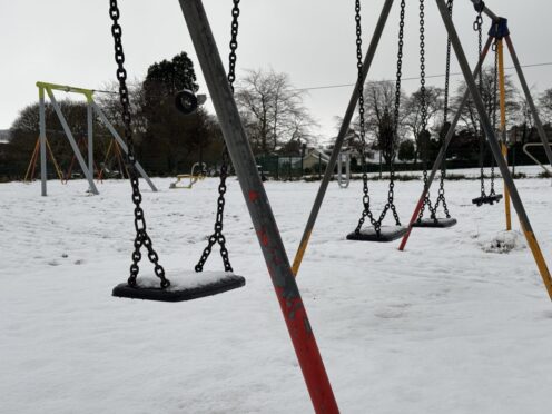 A play park in Inverness now under the cover of snow. Image: Will Angus/DCT Media.