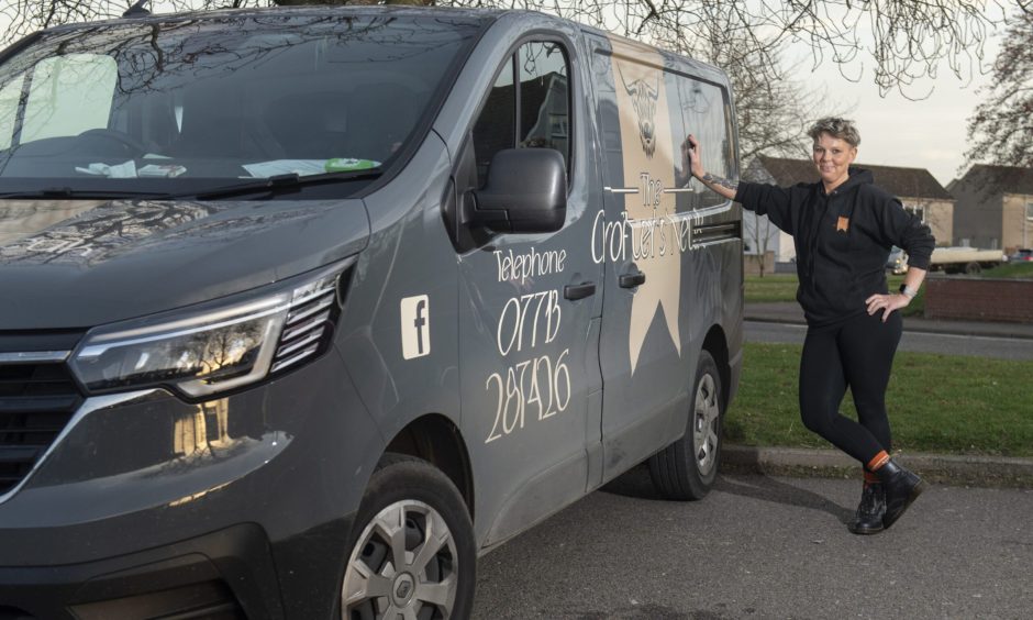 Gayle Johnstone next to Crofter's Neuk van. 