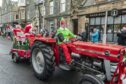 Mr and Mrs Claus on a festive tractor. Image: Jason Hedges/DC Thomson