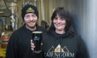 Cairngorm Brewery managing director
Sam Faircliff and head brewer Liam Anderson with the award-winning Black Gold beer. Image: Jason Hedges/DC Thomson.