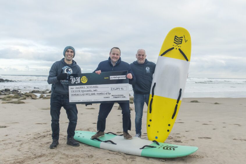 SurfABLE Scotland leaders Glyn Morris, far right, and Kev Anderson with P&amp;J editor Craig Walker.