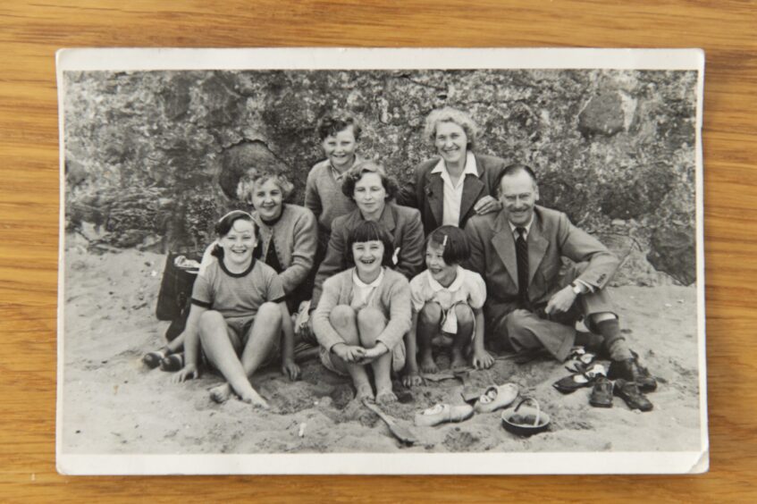 A black and white photo of Liz in Millport as an eight year old