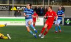 Andrew Macleod, right, scores Brora Rangers' first goal against Banks o' Dee. Pictures by Kenny Elrick/DCT Media.