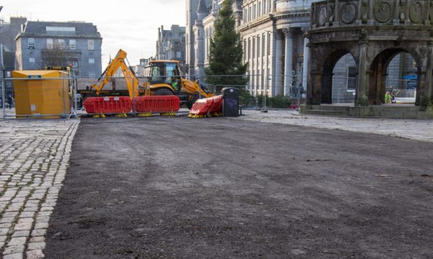 Work began today on the Castlegate. Image: Kenny Elrick/DC Thomson