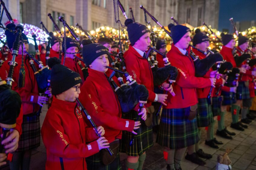 Robert Gordon's College Pipe Band performed at the opening of the village