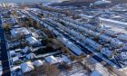 Snow covered the roofs of houses around Aberdeen.