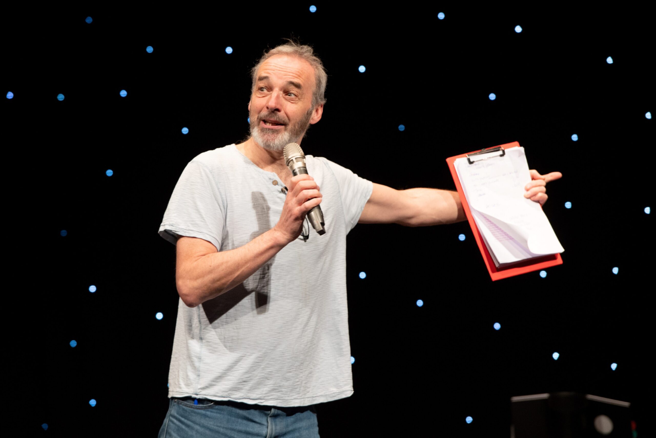 Alan McHugh presenting at The Archie Foundation Variety Show at the Tivoli Theatre.