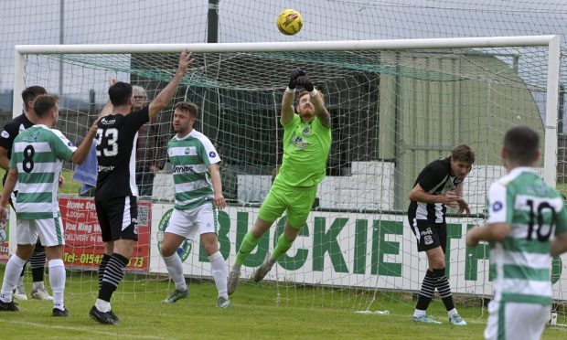 Elgin City goalkeeper Thomas McHale punching the ball clear from a corner against Buckie Thistle. Image: Kenny Elrick/DC Thomson.