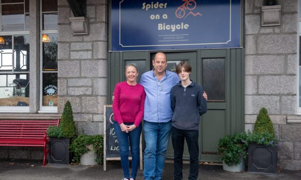 Spider on a Bicycle owner Alistair Tong (centre) with Maria Starkey and Matthew Tong. Image: Kath Flannery/DC Thomson