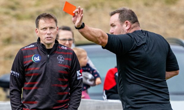 Oban Camanachd manager Gareth Evans is off. Image: Neil G Paterson.