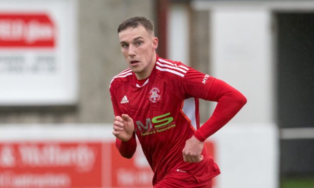 7 October 2023. This is from the Highland League Match between Lossiemouth FC and Wick Academy FC. PICTURE CONTENT: -Lossiemouth - James Leslie                 CREDIT - JASPERIMAGE