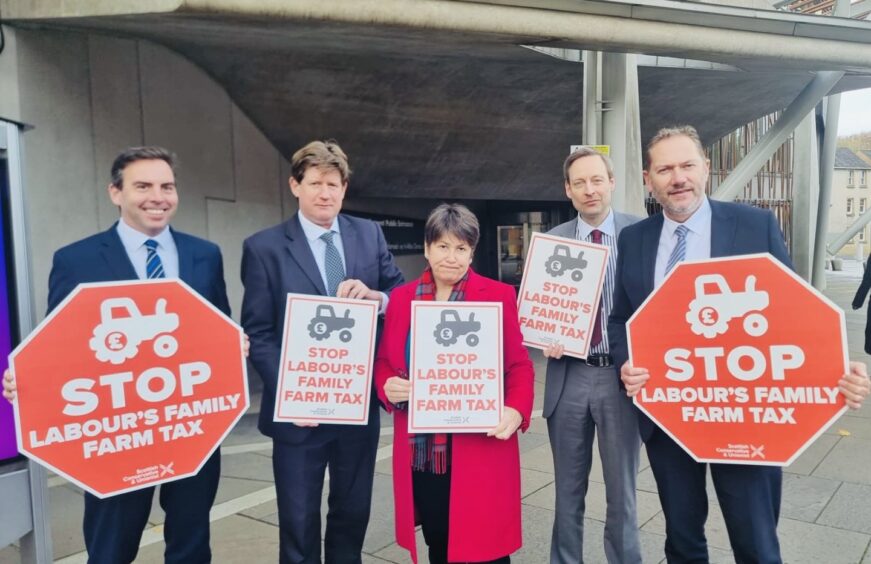 North-east MSPs with their 'farm tax' placards. 